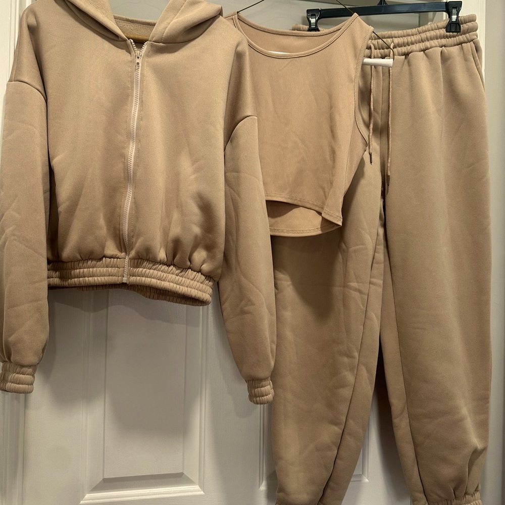 3 piece set. Solid crop tank top, drawstring waist sweatpants and hoodie.